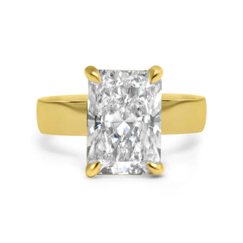 Rhiza | Moissanite Solitaire Thick Band
14K Yellow Gold Engagement Ring
Diamond Daughters
Front View