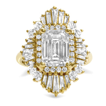 Casey | Bezeled Emerald Tapered Baguette and Round Brilliant Accent Stone 14K Yellow Gold Engagement Ring - Diamond Daughters, Front View