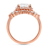 Casey | Bezeled Emerald Tapered Baguette and Round Brilliant Accent Stone 14K Rose Gold Engagement Ring - Diamond Daughters, Top View 