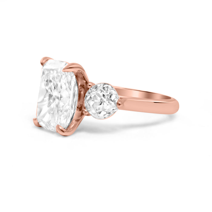 Krista | Three Stone Elongated Cushion Round Moissanite Shank Accent stone 14k Rose Gold Engagement Ring - Diamond Daughters, Side View