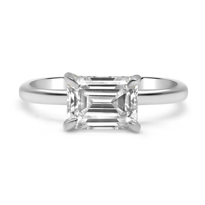 Maci | East West Emerald Cut Solitaire 14K White Gold Engagement Ring - Diamond Daughters, Front View