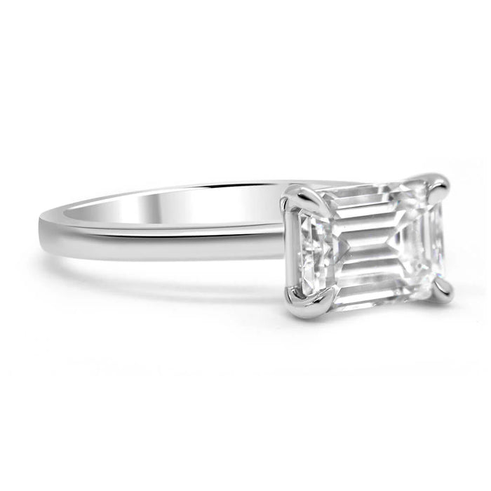 Maci | East West Emerald Cut Solitaire 14K White Gold Engagement Ring - Diamond Daughters, Front Side View